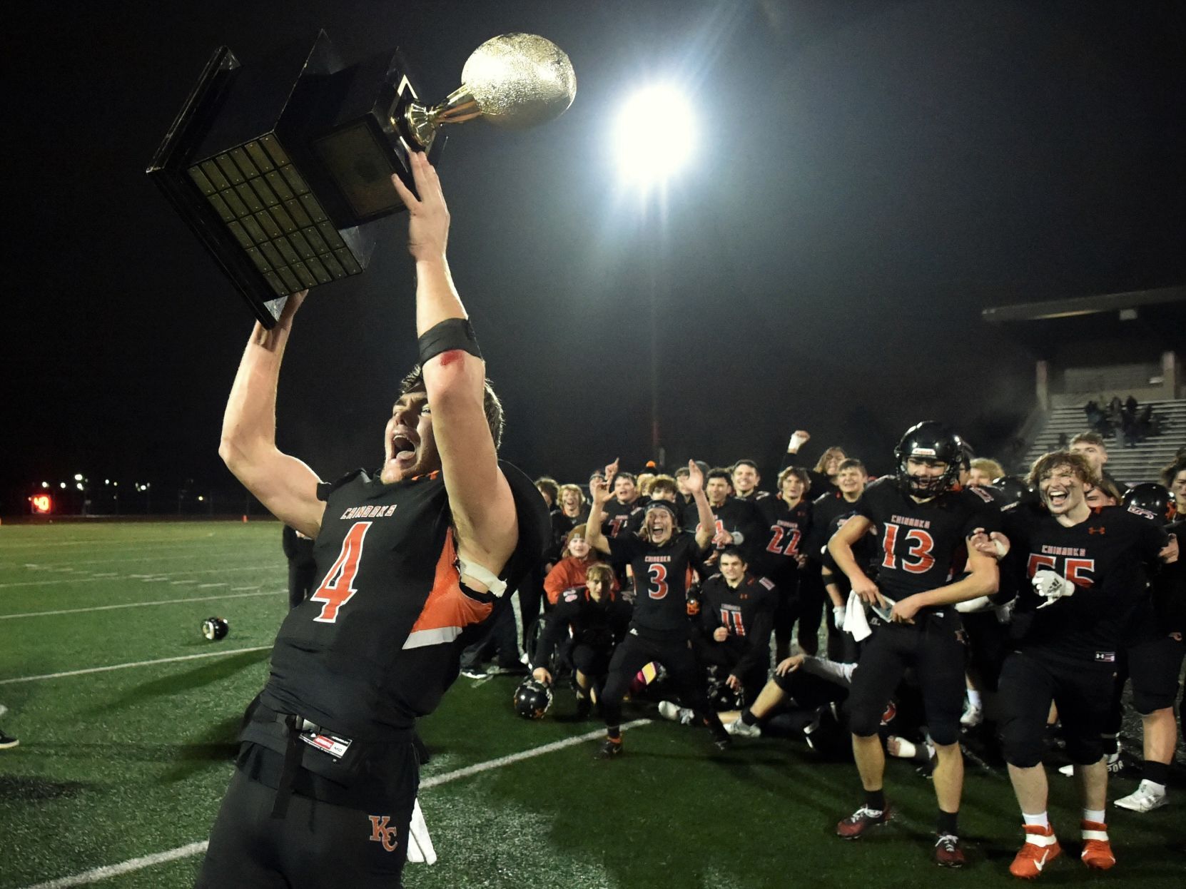 Jackson Esary holding trophy